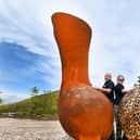 From left, David Williams and Maggie O'Neil are members of volunteer group, Friends of Paradise Park.  They are happy with the upgrades to their local park, including a newly installed sculpture celebrating nature at Paradise Park, Leyland.