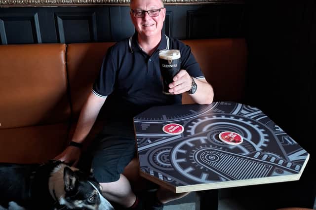 Cheers! Former Leyland milkman David Roper, 58, with his dog Rosie