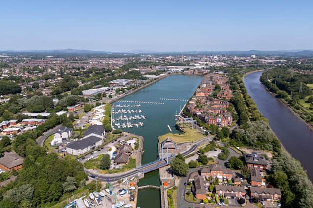 Preston Docks, with the re-directed River Ribble running adjacent to it.