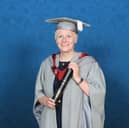 Yes chef! Lisa Goodwin-Allen pictured with her scroll after being honoured with an award at a special ceremony at the University of Lancashire. 