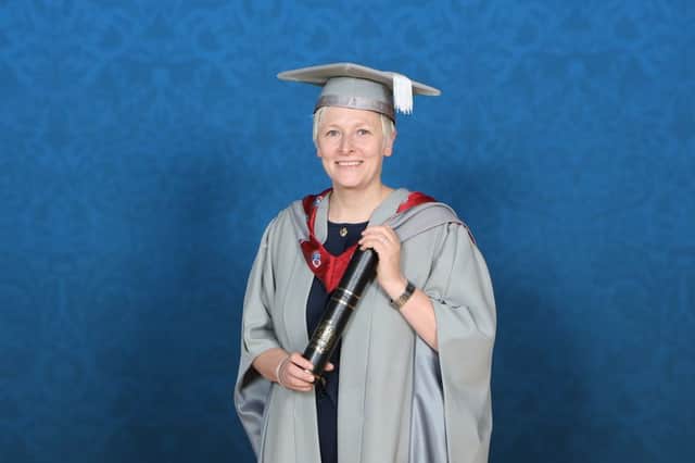 Yes chef! Lisa Goodwin-Allen pictured with her scroll after being honoured with an award at a special ceremony at the University of Lancashire.