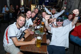 England fans enjoying themselves in Chew's Yard, Preston before the World Cup semi-final againt Argentina. Photo: Kelvin Lister-Stuttard