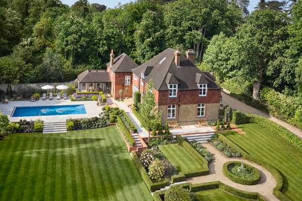 The former milkman scooped the luxury Surrey mansion in the latest Omaze draw.