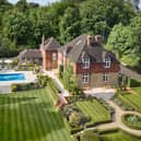 The former milkman scooped the luxury Surrey mansion in the latest Omaze draw.