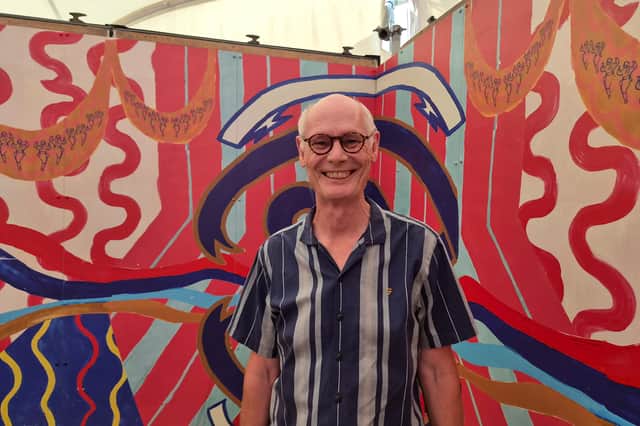 Charles Quick at the MET tent, now in Larches and Savick