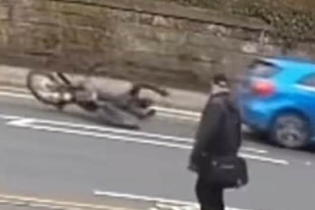 Lancashire Police have released footage of karma serving at its finest with the hilarious moment an 18-year-old boy falls off his bike after giving them the middle finger.