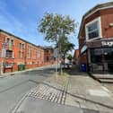 A present-day view along Lovat Road from Garstang Road, with Abrar Academy in the former Moor Park Methodist buildings and SugarBudz occupying the old chemist’s shop