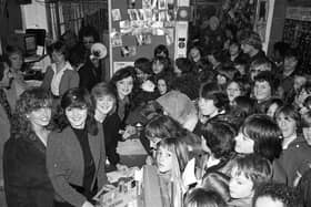 The Nolan Sisters take a break from performing in cabaret at Park Hall, in Charnock Richard to meet fans at record shop Malcolm's Musicland, in Chapel Street, Chorley on January 31, 1980