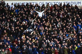 Preston North End fans celebrate after beating Bolton Wanderers away from in the last game between the two clubs