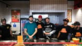 Jacob and Harley Nelson with SpudBros employees inside their new store