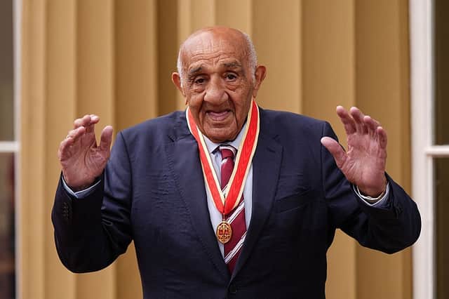 Sir Billy Boston at Buckingham Palace last year after receiving a belated knighthood