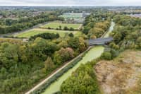 Blue-green algae has formed on top of the Lancaster Canal in Preston turning it green. Photo: Kelvin Lister-Stuttard