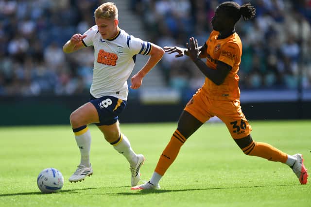 Preston North End's Ali McCann battles with  Wolverhampton Wanderers’ Mateus Mane
