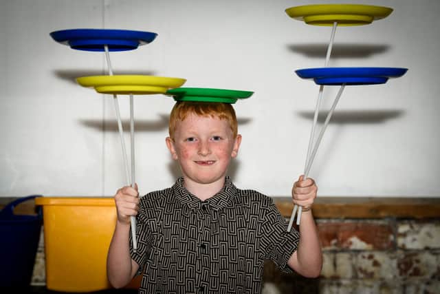 Master circus performer Adrian Catch shows of his interactive circus skills workshop for children at Chew's Yard in Preston. Photo: Kelvin Lister-Stuttard