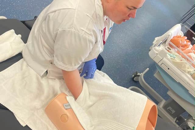 Katie Hay learns her trade as a midwife.