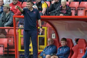 Preston North End manager Paul Heckingbottom shouts instructions to his team from the technical area at The Valley.
