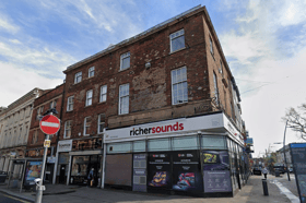The top three floors of the buildings at the junction of Church Street and Lancaster Road are to become holiday apartments