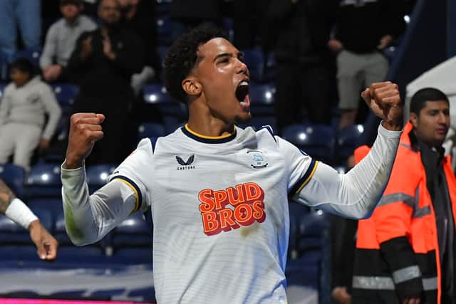 Caleb Wiley celebrates scori ng on his home debut.