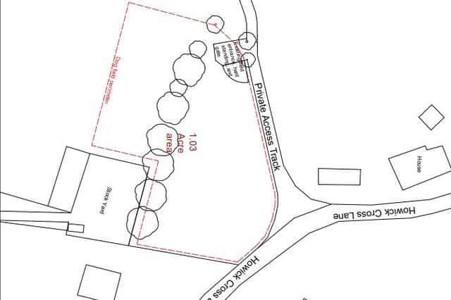 The proposed location of the dog walking field shown in red.