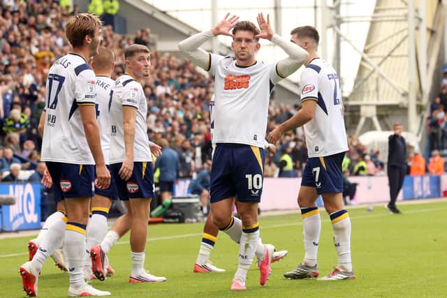 Preston North End's Callum Lang celebrates scoring his side's second goal. 
