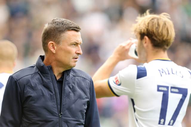 Preston North End manager Paul Heckingbottom with Stanley Mills.