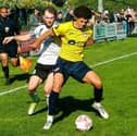 Tom Barkhuizen, left, in action for Brig