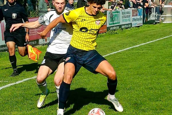 Tom Barkhuizen, left, in action for Brig