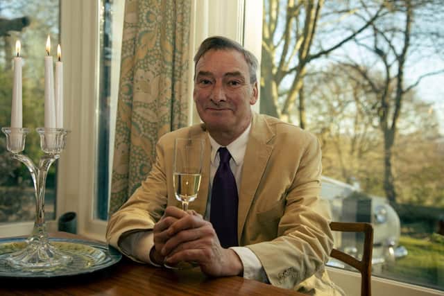 The late Tarquin Scott, pictured in the window of his home, Overleigh, overlooking Avenham Park