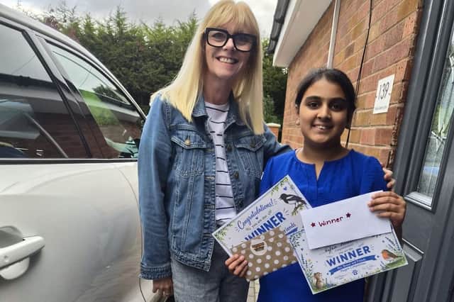 Mary Brown, a teaching assistant at Moor Nook Community Primary School turned author, with Waafa Hussain who will have a design featured in Mary’s new book