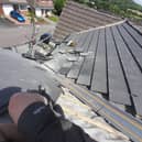 Work being carried out on the roof in Chorley which was left unfinished by a rogue trader.