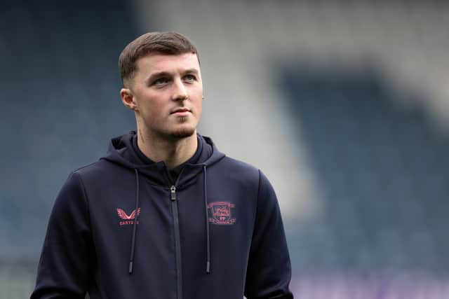 Preston North End's Alfie Devine looks on before the match 