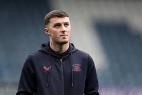 Preston North End's Alfie Devine looks on before the match 