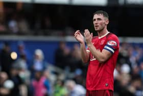 Preston North End's Jordan Thompson applauds his side's travelling supporters at the end of the match 