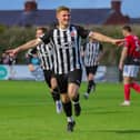 Elliot Taylor celebrates scoring against Darlington