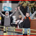 People celebrate as they leave HMP Bristol in Horfield, north Bristol. Around 700 prisoners will walk free from jail in the first wave of the controversially expanded programme to free up spaces in prisons.