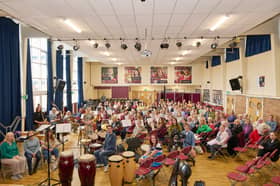 Recording of the Hello, Goodbye orchestra project at Penwortham Girls' Grammar School, Penwortham, Preston, Lancashire, UK, marking the demolition of the old school buildings. The event was attended by over 130 former pupils.