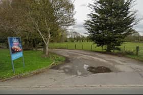Access is proposed off an existing lane off Highfield Road, leading to the restaurant car park