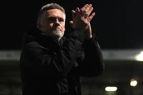 Graham Alexander applauds after a game