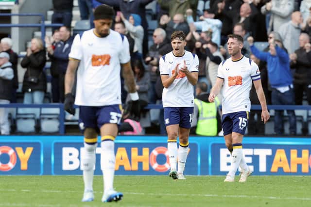 Preston North End's Jordan Storey (Ctr) and Jordan Thompson (right) react after Millwall's Camiel Neghli (not pictured) opened the scoring