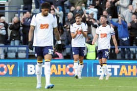 Preston North End's Jordan Storey (Ctr) and Jordan Thompson (right) react after Millwall's Camiel Neghli (not pictured) opened the scoring