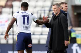 Preston North End manager Graham Alexander consoles Thierry Small at the final whistle