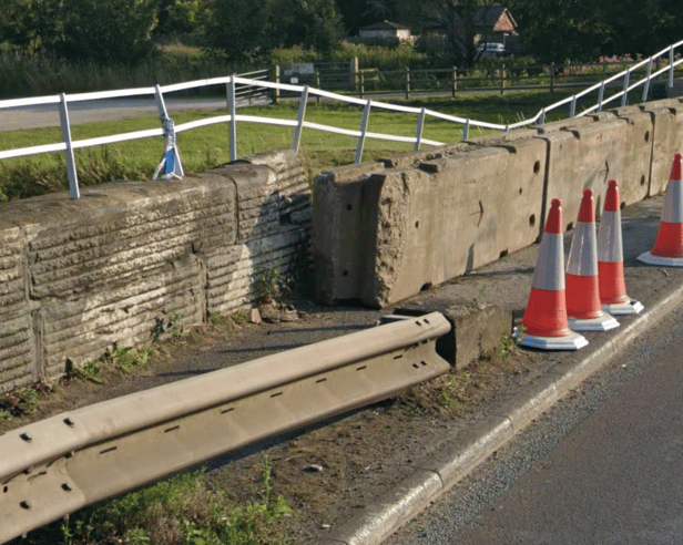 The permanent safety barrier ends before the part of the bridge that is most often struck - meaning emergency concrete blocks have to be put in place to prevent an exposed drop