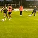 PNE's Michael Ayodele and Nathan Morris warm up before the game with Burnley