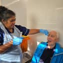 Christopher Howarth having the pill on a thread test with senior research nurse Irene Debiram-Beecham