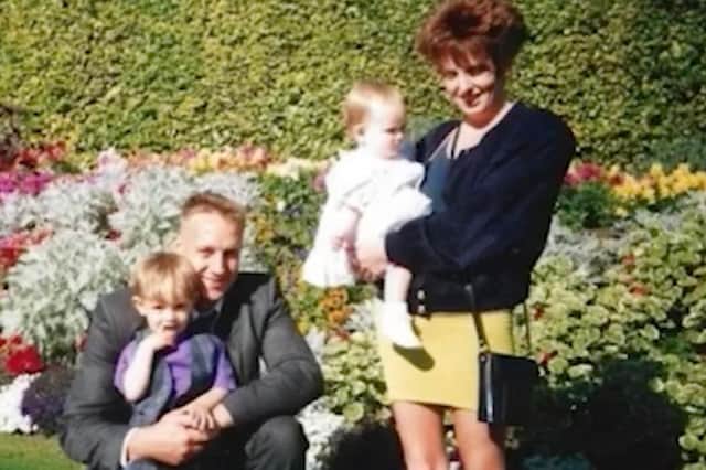 Simon Clayton with his wife and children