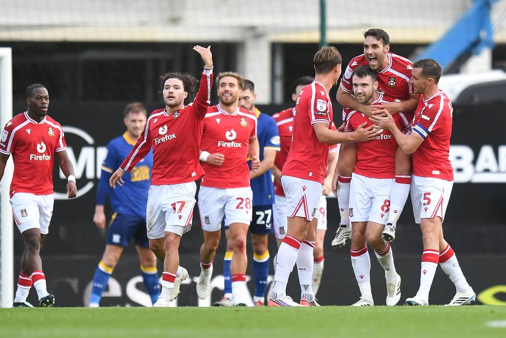 Wrexham's Ben Whiteman celebrates scoring his team’s second goal 