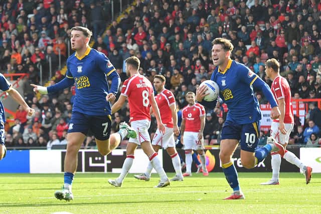 Preston North End's Alfie Devine celebrates scoring his team’s first goal 