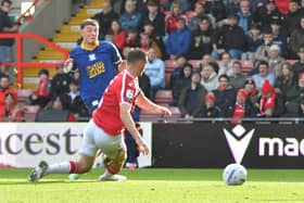 Preston North End's Alfie Devine scores his team’s first goal