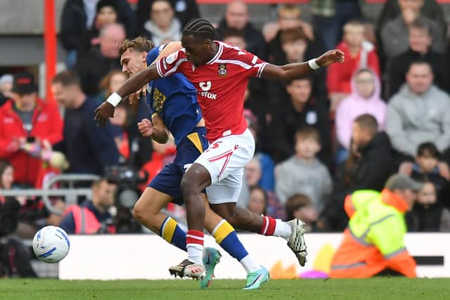 Preston North End's Ed Nolan battles with  Wrexham's Jacques Ekomie