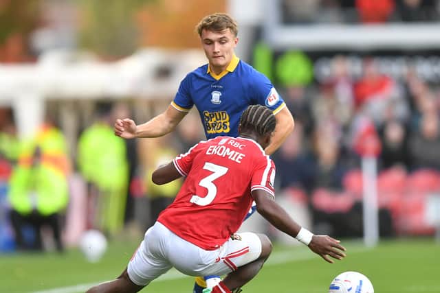 Preston North End's Ed Nolan battles with  Wrexham's Jacques Ekomie